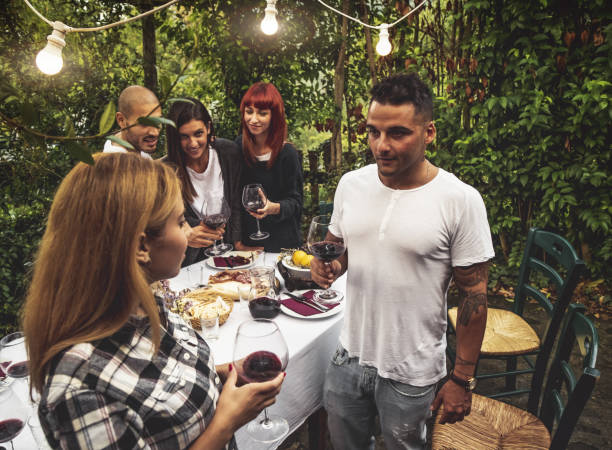 istock Friends having a dinner outdoor 1131315198