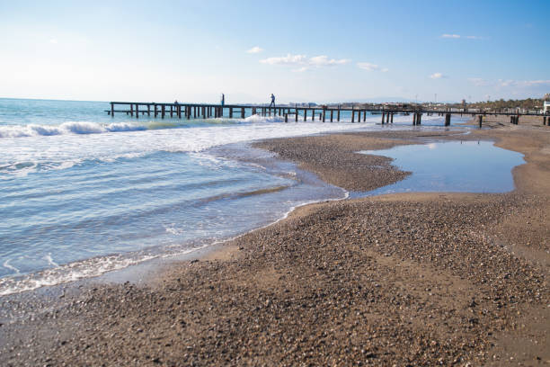 istock ruined pier on the beach 1131316172