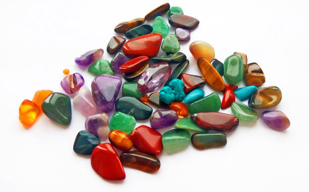 istock Assorted natural bright coloured semi precious gemstones and gems on white background for design and decoration 1131316986