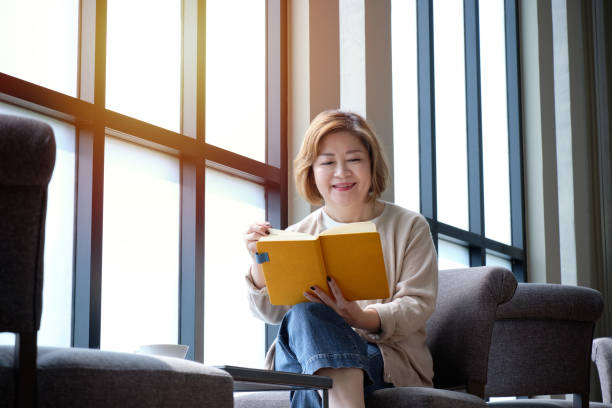 istock Elderly woman relaxing in cafe. 1131318736