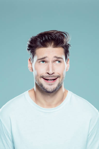 istock Confused young man looking away 1131319734