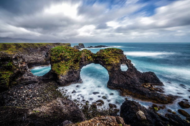 istock Gatklettur basalt rock in Arnarstapi in Iceland. 1131319864