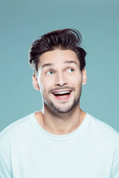 istock Excited young man looking away 1131320356