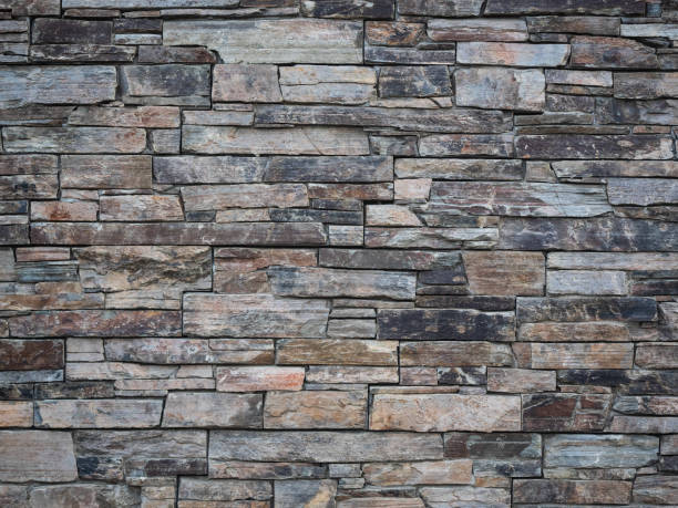 istock Background of old vintage dirty brick wall with peeling plaster, texture 1131322255