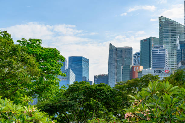 In downtown Singapore skyscrapers are dominating the area. Most of the skyscrapers are head offices of global banks. Seen during a summer day.