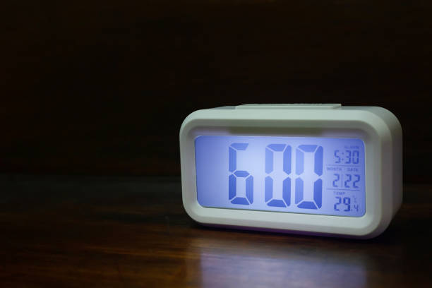 istock Digital alarm clock  6:00 close up image. 1131326598