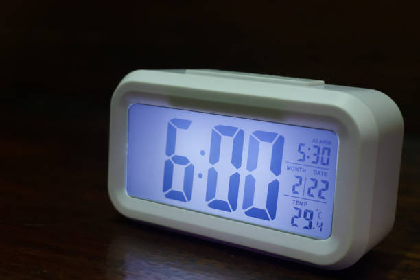 istock Digital alarm clock  6:00 close up image. 1131326715