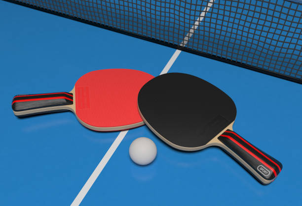 istock Table tennis set. Two rackets with ball on a blue game table. 3d rendering 1131332229