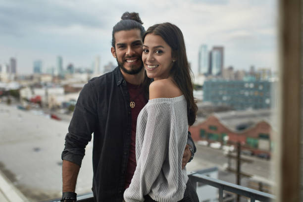 istock Happy couple spending leisure time in balcony 1131333544