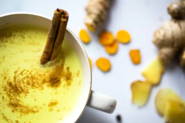 A soothing, healthy and delicious drink made of coconut and/or almond milk with turmeric, ginger, cinnamon and pepper. The bright yellow colour comes from the turmeric root.