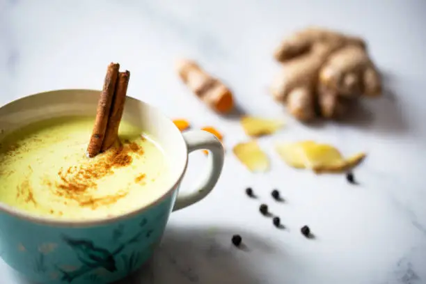 A soothing, healthy and delicious drink made of coconut and/or almond milk with turmeric, ginger, cinnamon and pepper. The bright yellow colour comes from the turmeric root.