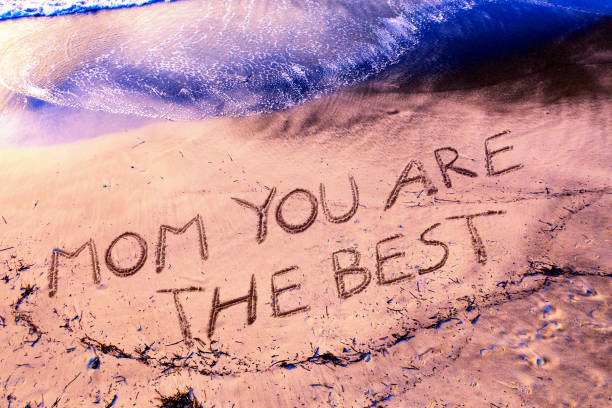 istock Mother's Day celebration on the beach - 1131335698