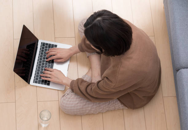 istock asian female work in room 1131337253