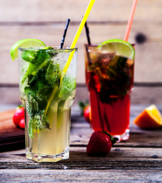 istock Tradition Summer drink mojito with lime and mint, strawberries 1131337924