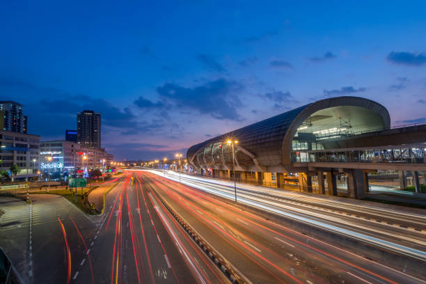 istock light trail & night scenery at highway beside LRT station 1131339445