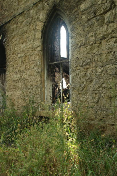 istock Burned church in Eleroy, Illinois, arched window 1131344287
