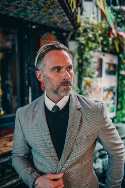 istock Handsome mature gentleman in suit 1131345610