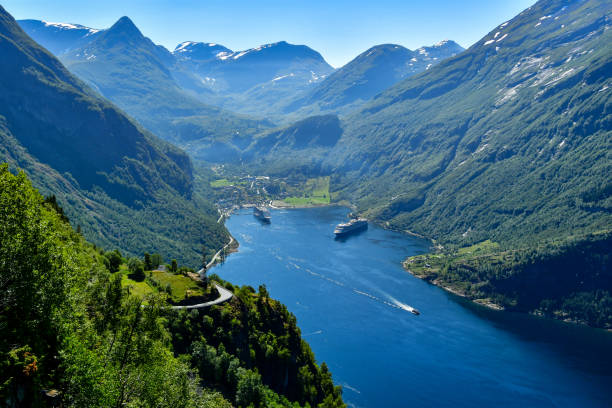 travel by ferry in geiranger norway stock photo