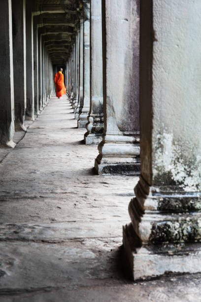 istock buddhist monk in the temple of Angkor Wat 1131347027