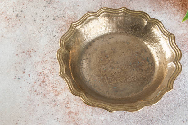 istock Vintage brass plate on concrete background. 1131347970