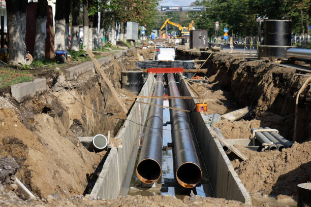 Replacement pipes in the city.Construction of heating mains for municipal infrastructure, the concept of city development. stock photo