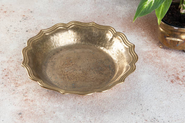 istock Vintage brass plate on concrete background. 1131348966