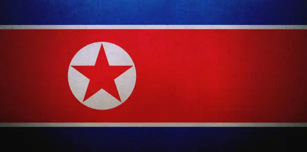 Photo of Grunge North Korean flag printed on a paper