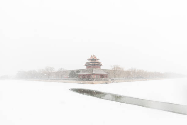 istock Beijing Forbidden City corner tower in snow 1131351018