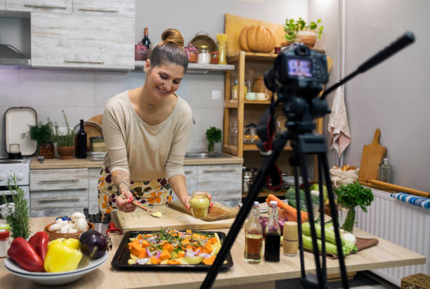 istock Success young woman enjoying at cooking and vlogging 1131352011