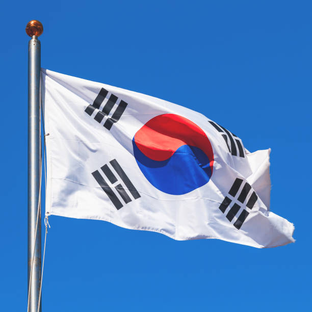 istock South Korea flag over blue sky 1131352184