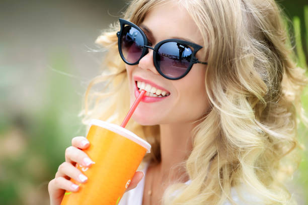 istock Woman drinking juice on a hot summer day. 1131353070