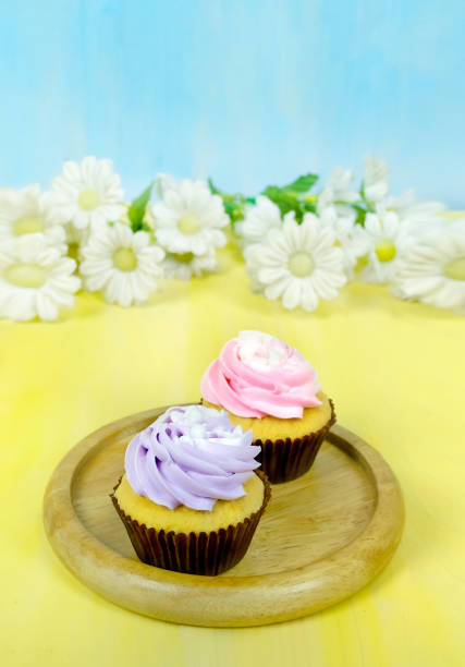 istock Tasty cupcakes with  whipping cream 1131354573