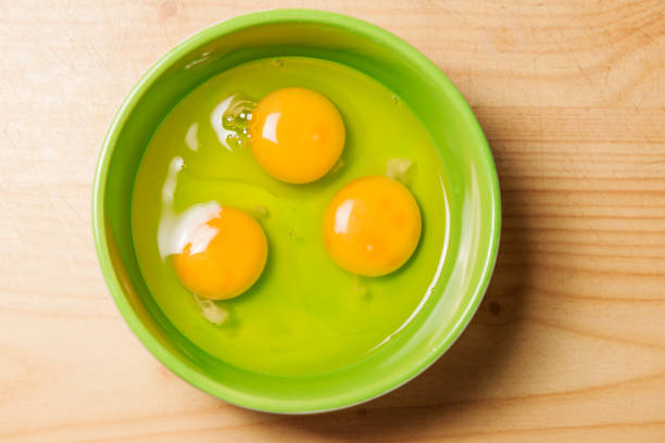 three eggs - shiny group of objects high angle view close up imagens e fotografias de stock