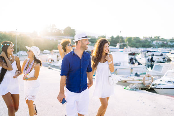 istock Tourists walking on street during vacations 1131355429