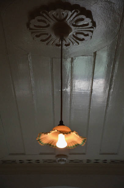 istock Lamp light up attached from the wooden ceiling 1131356395