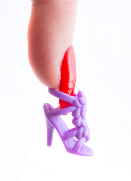 istock Plastic stiletto nails, with fashion doll shoes 1131356551