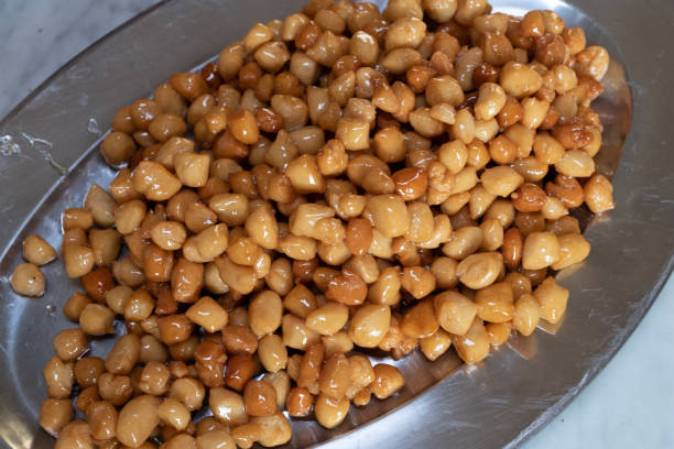 Struffoli . Honey Glazed, Fried stock photo