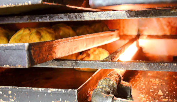 Stylized Background of Maltese pastries (pastizzi) inside an oven stock photo