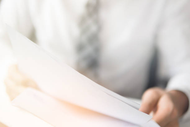 istock Businessman working with documents. Shopping online. White background. Close up telephone. Sending email, mobile phone. Office work concept. light leaks 1131365507