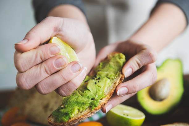 istock Fresh tomato and avocado sandwich 1131365591