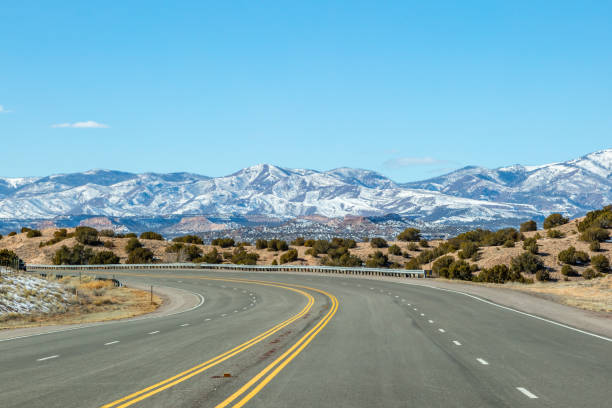 Snow Capped Mountains in New Mexico The view of snow capped mountains whilst on the road to Los Alamos, New Mexico los alamos new mexico stock pictures, royalty-free photos & images