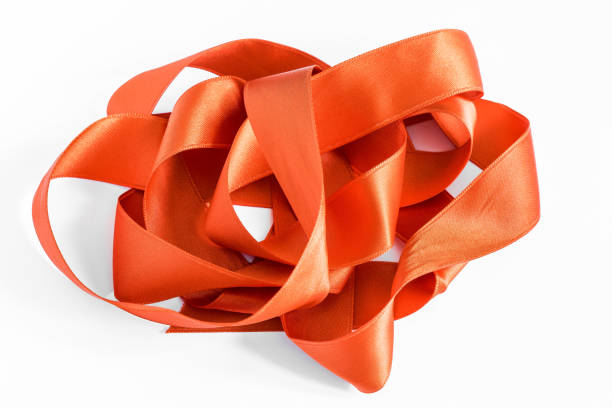 istock A long red ribbon on a white background 1131370174