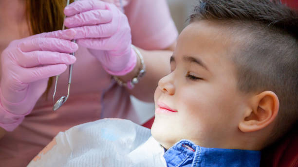 istock Little boy at the dentist 1131370379