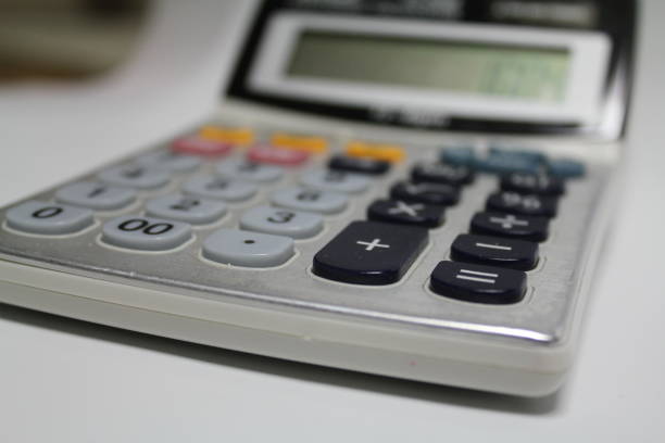 Calculator Machine for calculation 성인 stock pictures, royalty-free photos & images