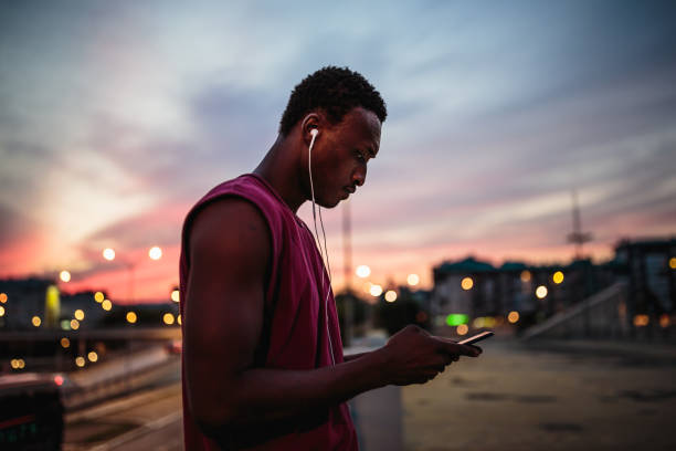 istock Male athlete texting after jogging exercise 1131374850