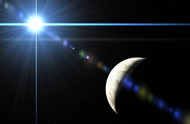 istock lens flare, blue light in front the moon 1131375037