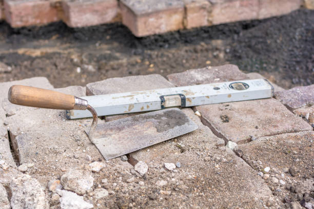istock Paving stones are laid after manhole work 1131376940