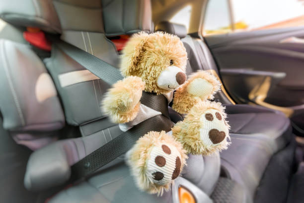istock Teddy in the child seat at a full stop 1131378607