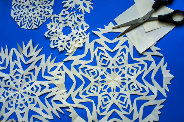 istock Christmas snowflakes cut from paper 1131382370