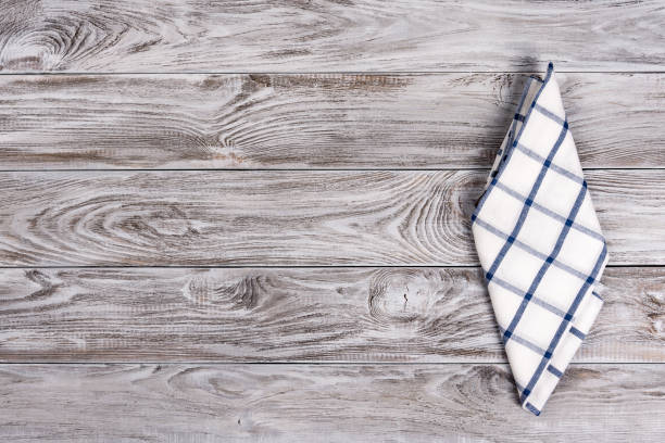 istock Cooking food or pizza wooden table background with blue and white textile. Copy space for text 1131384203